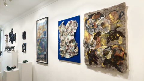 artworks on gallery wall